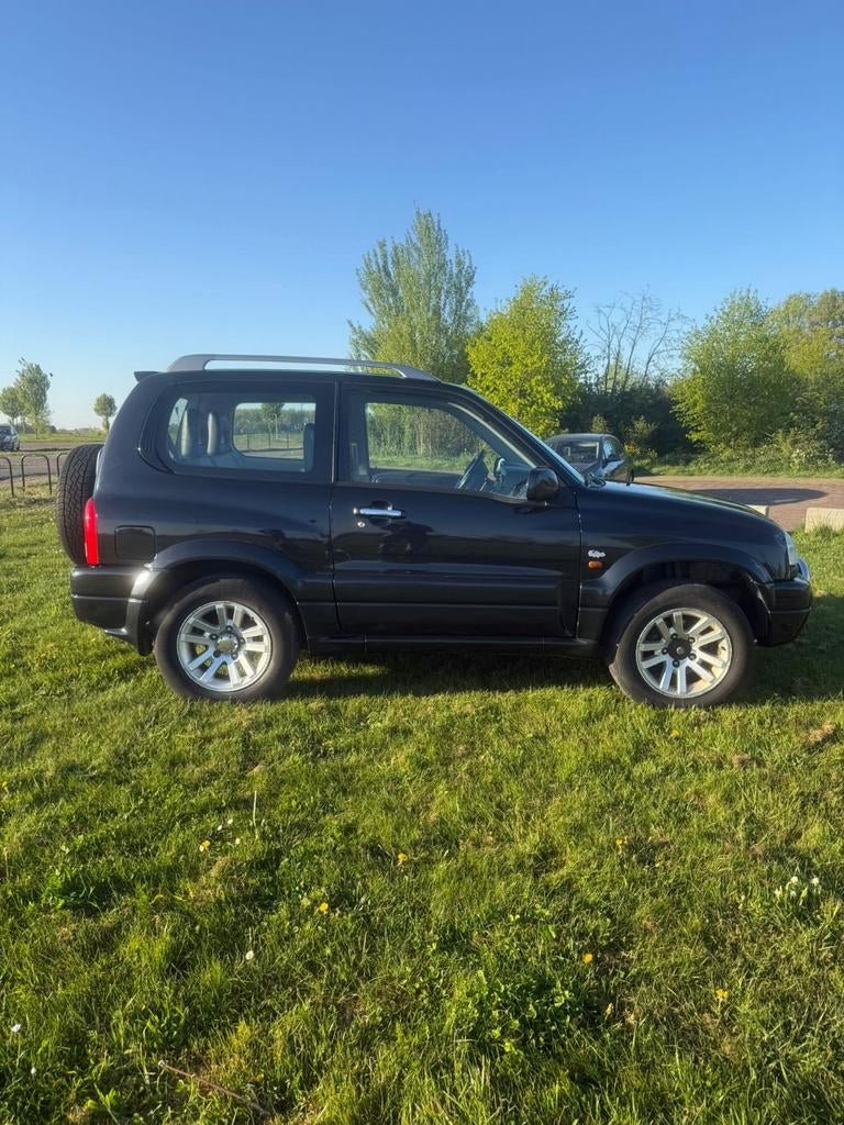 Suzuki Grand Vitara 1.6 3D 2005 Zwart, Auto's, Suzuki, 13 km/l, 4 cilinders, Zwart, Handgeschakeld