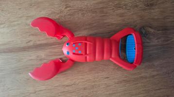 Grijper voor in de zandbak. beschikbaar voor biedingen