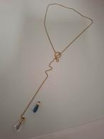 Gouden ketting met blauwe en heldere steen. Van melano.Goud, Ophalen of Verzenden, Zo goed als nieuw, Met edelsteen, Goud