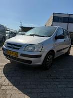 Hyundai Getz 1.3 5DRS 2004 Grijs, Auto's, Voorwielaandrijving, Euro 5, 4 cilinders, Origineel Nederlands