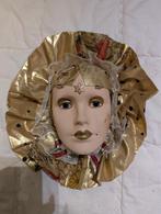 Decoratief masker met gouden accenten, Ophalen