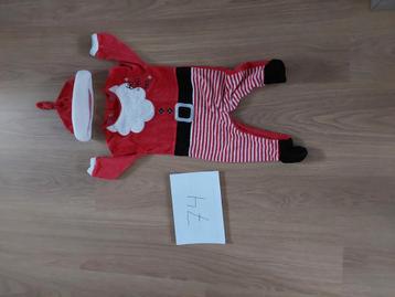 Kerstman pakje maat 74 beschikbaar voor biedingen