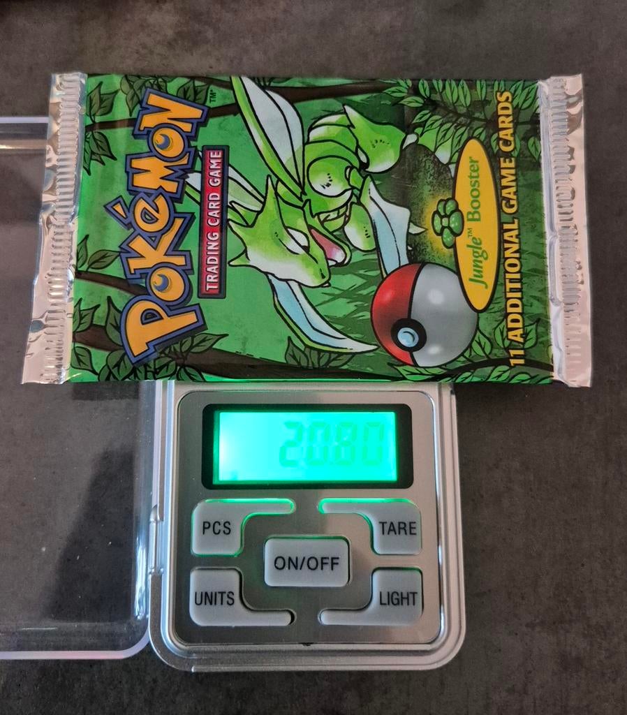 Jungle Booster Pack Sealed 20.80 gram, Ophalen of Verzenden, Zo goed als nieuw