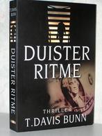 T. Davis Bunn - Duister Ritme (spannend christelijk boek), Boeken, Romans, Ophalen of Verzenden, Zo goed als nieuw