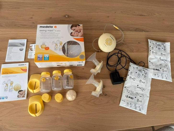 Medela dubbele borstkolf + 3 nieuwe flesjes + 40 melkzakjes, Kinderen en Baby's, Babyvoeding en Toebehoren, Gebruikt, Borstkolf