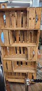 Toren van houten veilingkistjes, Ophalen