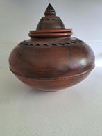 Indonesische pot, Ophalen