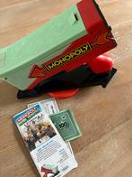 Spel Monopoly geld graaien, Hobby en Vrije tijd, Gezelschapsspellen | Overige, Drie of vier spelers, Verzenden, Zo goed als nieuw