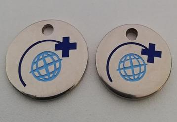 Winkelwagenmuntjes International Medical Mission 21 en 24 mm beschikbaar voor biedingen