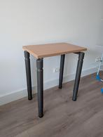 In hoogte verstelbare tafel, Ophalen