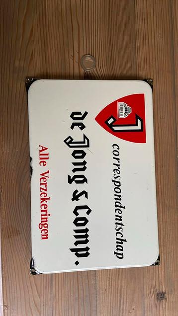 Emaille reclamebord correspondentschap De Jong & Comp. beschikbaar voor biedingen