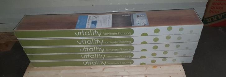 10,8 m2 laminaat Vitality de Luxe 2V- 797 Sunset Eik., Huis en Inrichting, Stoffering | Vloerbedekking, Nieuw, Laminaat, 10 tot 25 m²