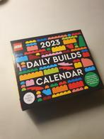 Boek - Lego 2023 Daily Builds calender, Boeken, Overige Boeken, Ophalen of Verzenden, Zo goed als nieuw