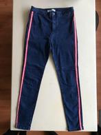 Stradivarius blauwe jeans jegging met rood streepje, Blauw, Ophalen of Verzenden, Zo goed als nieuw, W30 - W32 (confectie 38/40)