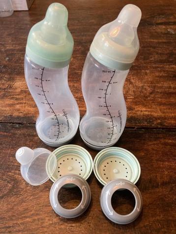 Diverse Babyflesjes / Flessenwarmer / Flessenrekje beschikbaar voor biedingen