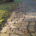 Twee ijzeren eggen, Ophalen