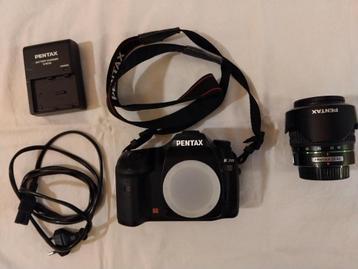 Pentax DSLR K20D met objectief 18-55 mm en drie manuals beschikbaar voor biedingen