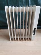 Radiator olie kachel., Doe-het-zelf en Verbouw, Ophalen, 30 tot 80 cm, Gebruikt, Kachel