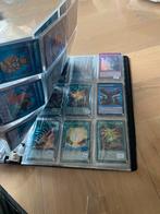 Partij Yu gi oh kaarten map vol 140-150 kaarten. 1e editie, Ophalen of Verzenden, Zo goed als nieuw