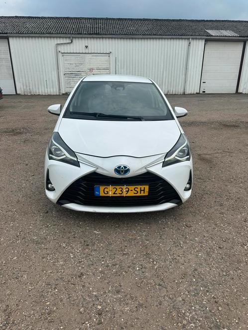 Toyota Yaris 1.5 Hybrid 100pk CVT 2019 Wit, Auto diversen, Schadeauto's, Automaat, Hybride Elektrisch/Benzine, Hatchback, Wit