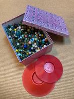 Doos met veel knikkers, Ophalen, Gebruikt