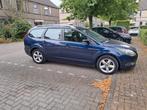 Ford Focus 1.6 16V 100PK 2010 Blauw, Auto's, 1596 cc, 4 cilinders, 100 pk, Navigatiesysteem