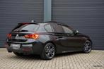 BMW 1-serie M140i LCI2 | Akrapovic | Schuifdak | HK | Camera, Adaptive Cruise Control, Achterwielaandrijving, Gebruikt, Bedrijf