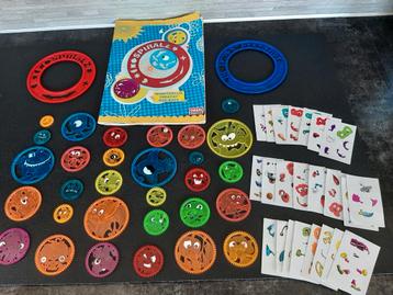 Spyrals van supermarkt Deen met rode en blauwe ring + boek beschikbaar voor biedingen