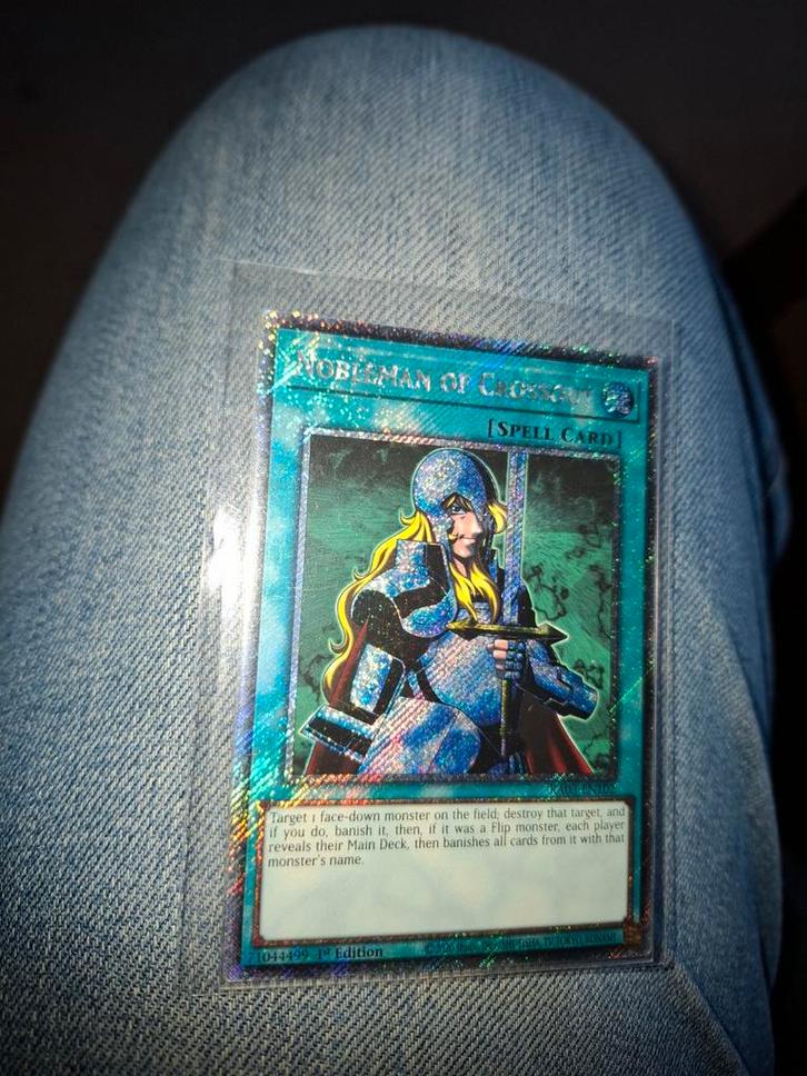 Nobleman of Crossout RA03 Platinum Secret Rare NM, Hobby en Vrije tijd, Verzamelkaartspellen | Yu-gi-Oh!, Nieuw, Losse kaart, Foil