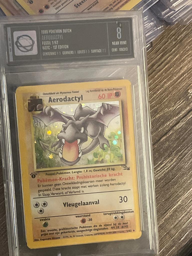 Pokémon kaarten 1999 base fossiel first edition holo, Ophalen of Verzenden, Zo goed als nieuw, Meerdere kaarten, Foil