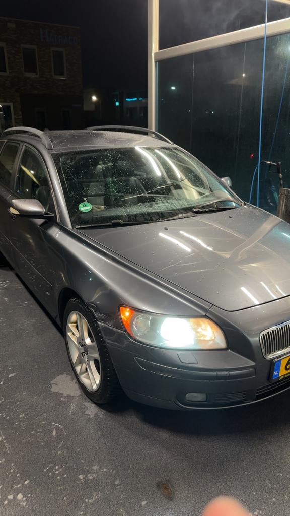 Volvo V50 2.4 170PK Geartronic 2006 Grijs, Ophalen of Verzenden