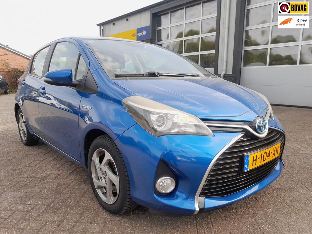 Toyota Yaris 1.5 Hybrid - Navigatie - Automaat - Trekhaak, Auto's, Gebruikt, Euro 6, 4 cilinders, Blauw
