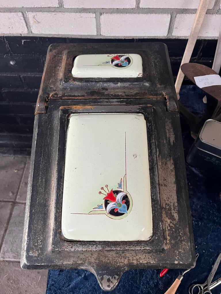 Gietijzeren kolenkit art deco, Ophalen