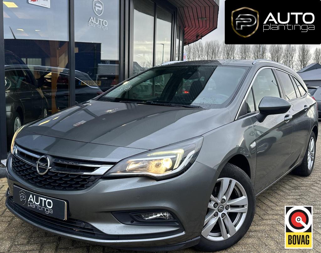 Opel Astra Sports Tourer 1.4 Turbo 120 Jaar Edition 150PK |, Auto's, Stof, Gebruikt, 150 pk, Bluetooth