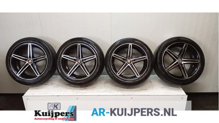 Sportvelgenset + banden van een Chrysler Grand Voyager, Gebruikt, -, -, -