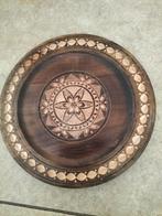 Uitgewerkt hout bord, Ophalen