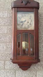 antieke hang klok, Ophalen