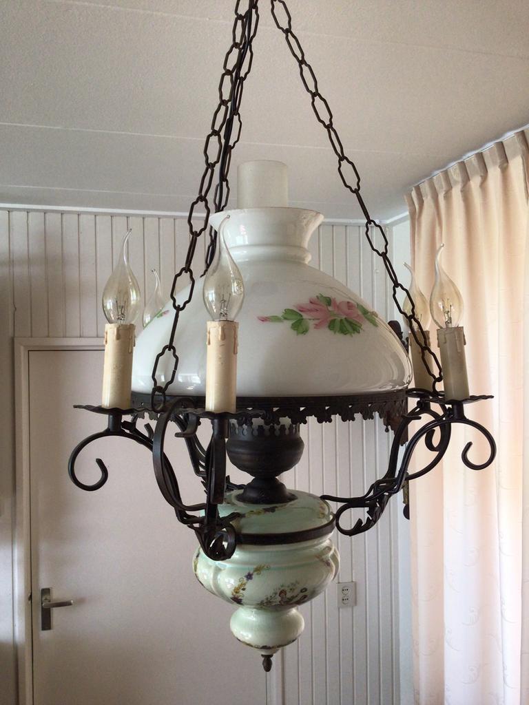 Oude lamp zonder brander, Ophalen