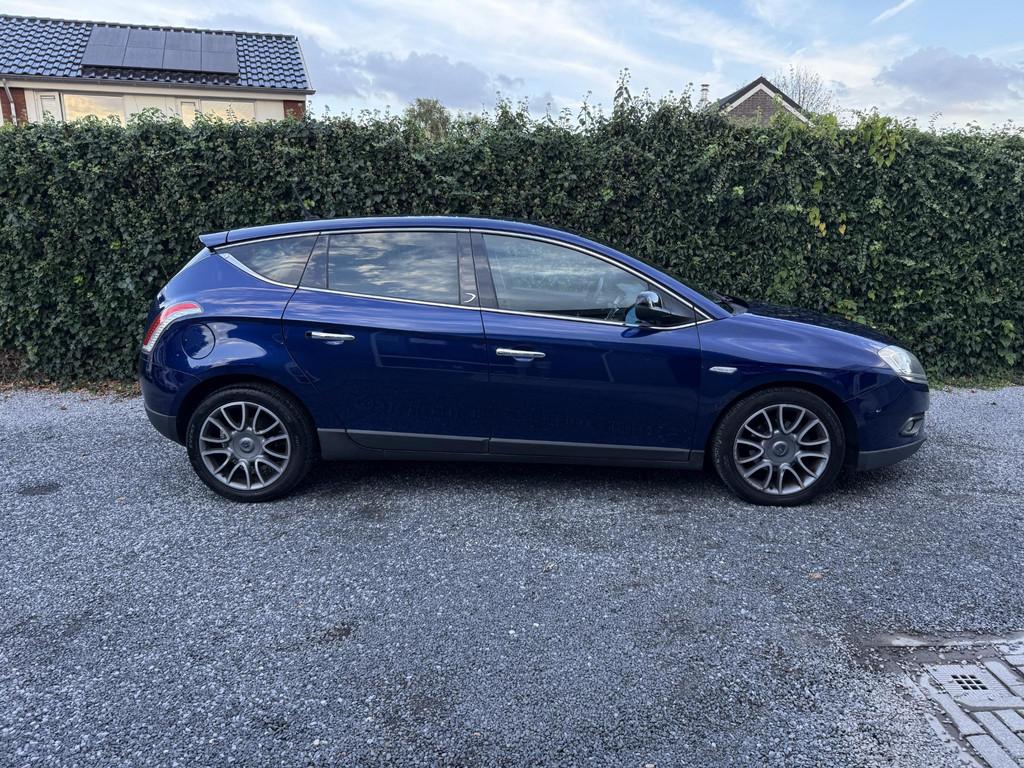 Lancia Delta 1.4-16V Turbo Oro | Navi | Autom. Airco | Cruis, Auto's, Voorwielaandrijving, 1295 kg, 4 cilinders, Blauw