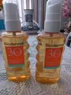 Twee fles zonne brand olie om te smeren is een spray oli, Verzamelen, Ophalen of Verzenden, Parfumfles