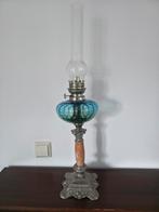Blauwe antieke olie lamp, Ophalen