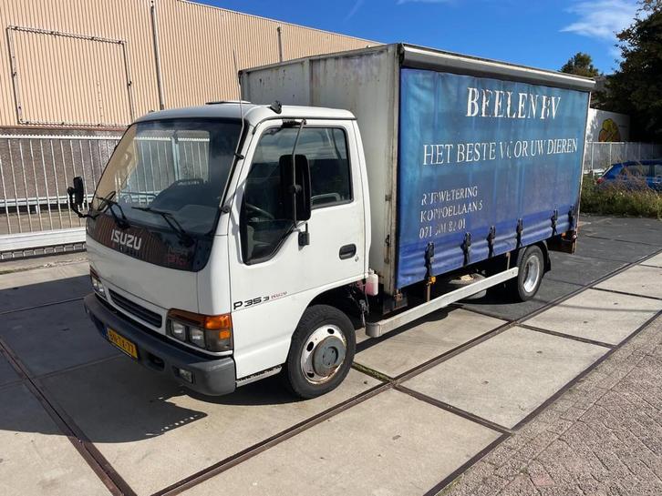 Isuzu NPR77L-5H WEINIG KM:178909!RIJDT GOED!SCHAKELT GOED!DB, Auto's, Vrachtwagens, Bedrijf, Te koop, Elektrische ramen, Radio