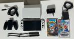 Nintendo Switch OLED + 2 Games Crash Bandicoot, Mario Wonder, Spelcomputers en Games, 1 speler, Ophalen of Verzenden, Zo goed als nieuw