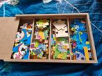 4 puzzels met 24 stukjes
in houten doos, Ophalen of Verzenden, 10 tot 50 stukjes, Zo goed als nieuw, Van hout