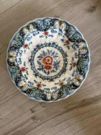 Wandbord makkum, Ophalen