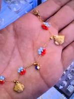 Gouden kleur armband met bedels, Overige materialen, Nieuw, Ophalen of Verzenden, Met bedels of kralen