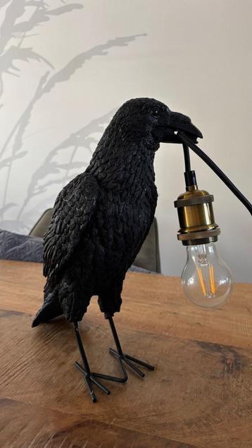 Zwarte ravenlamp beschikbaar voor biedingen
