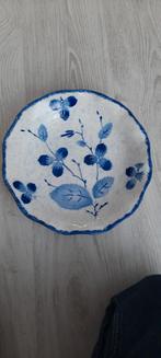 Delfts blauw bord, Ophalen