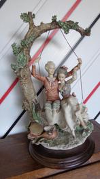 Groot Italiaans beeldje Koppel op schommel G.Armani, Ophalen, Zo goed als nieuw, Mens