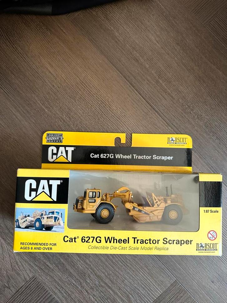 Cat 627G Wheel Tractor Scraper - Norscot 1:87, Hobby en Vrije tijd, Modelbouw | Auto's en Voertuigen, Nieuw, Overige typen, 1:50 of kleiner